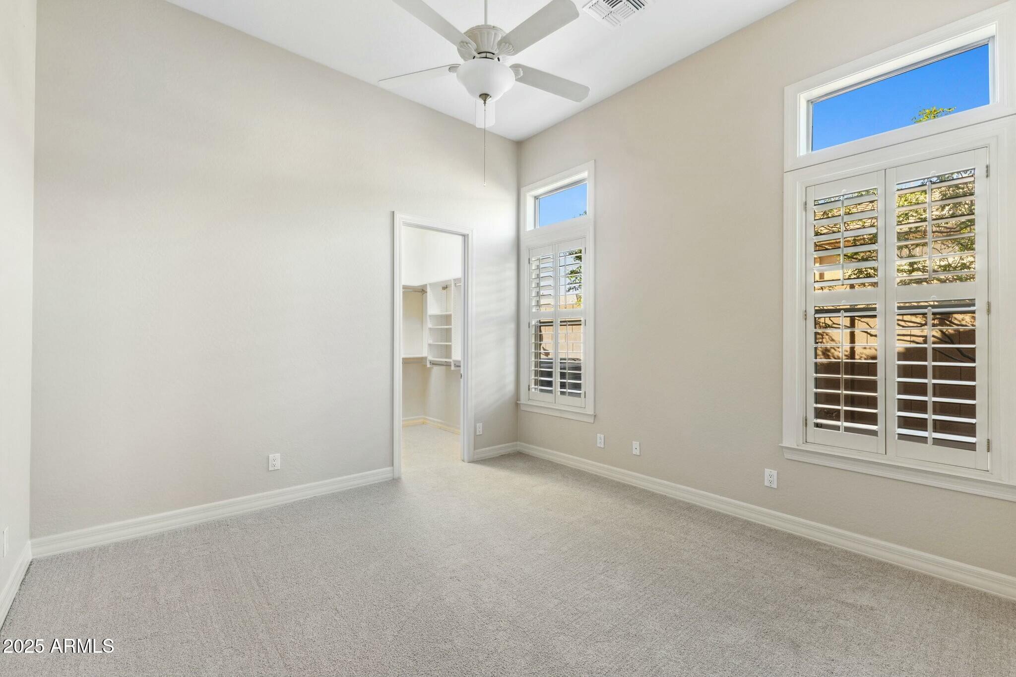 41601 North River Bend Road Anthem, AZ 85086 - Photo 22 of 97 a view of an empty room with a window