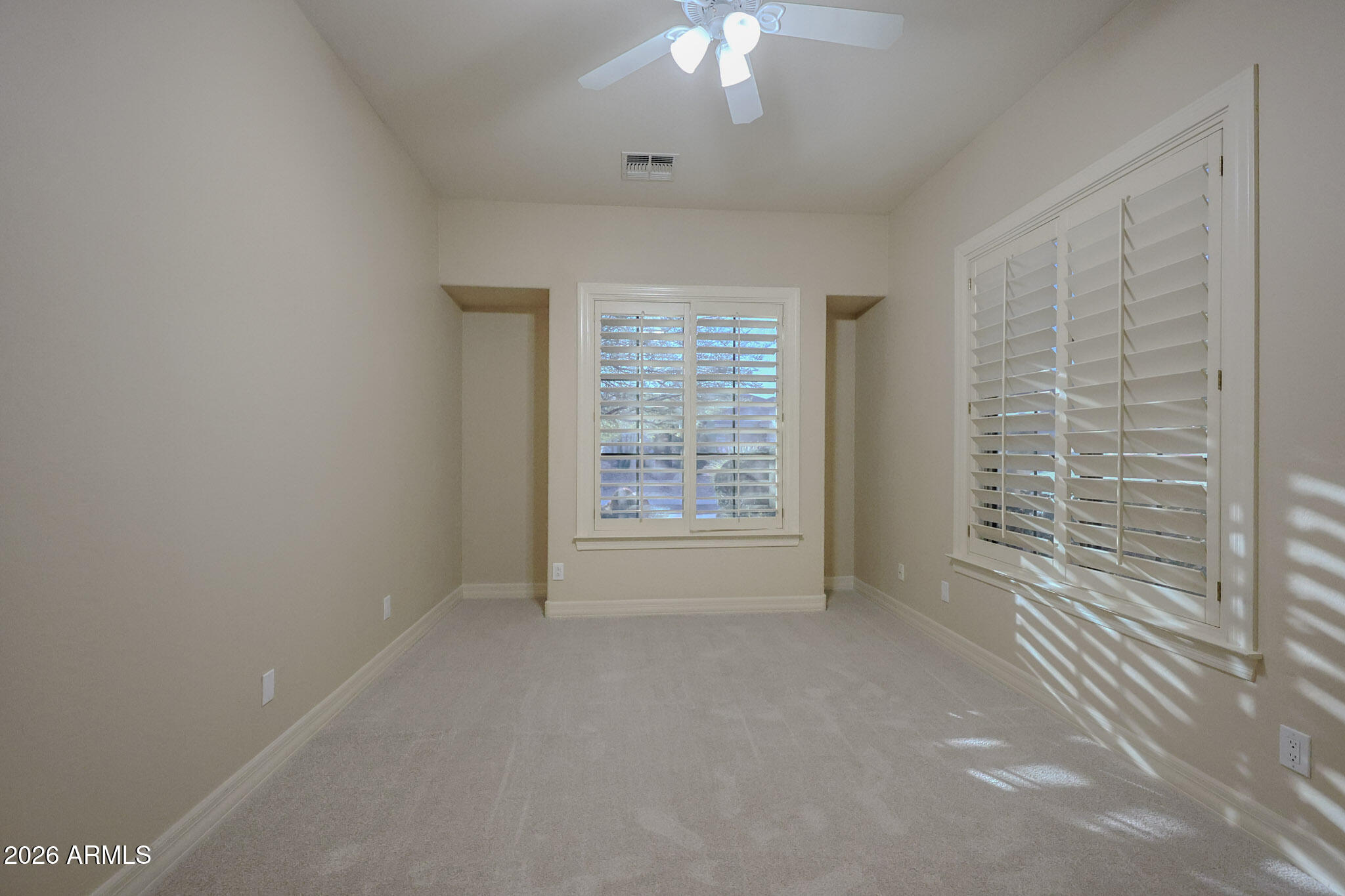 41601 North River Bend Road Anthem, AZ 85086 - Photo 36 of 97 a view of an empty room with a window