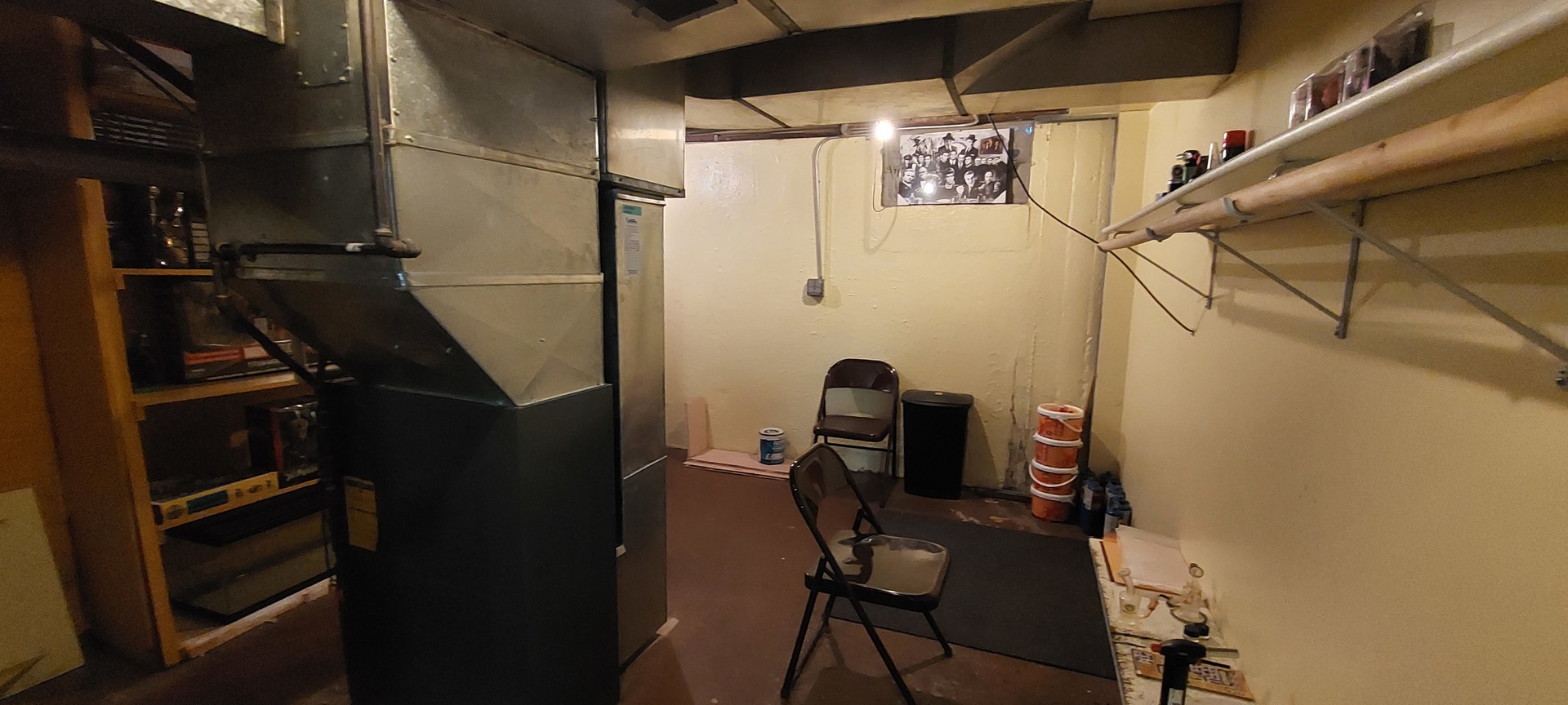 554 South Craig Place Lombard, IL 60148 - Photo 13 of 14 a view of storage and utility room with racks on the wall