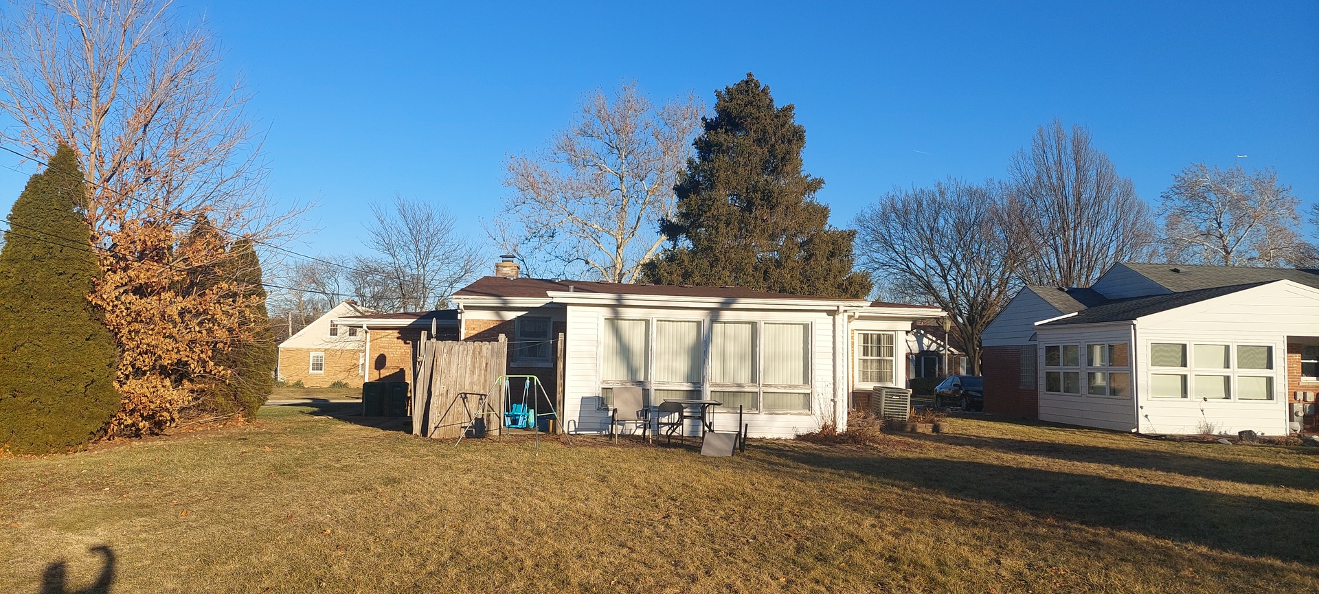 554 South Craig Place Lombard, IL 60148 - Photo 14 of 14 a view of a white house with a street
