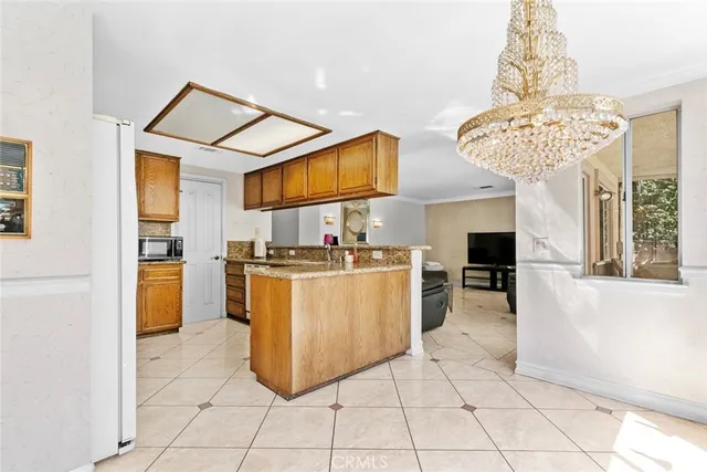 a view of kitchen with furniture and window
