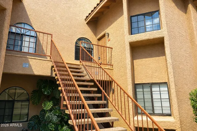 a view of balcony with wooden floor and plants