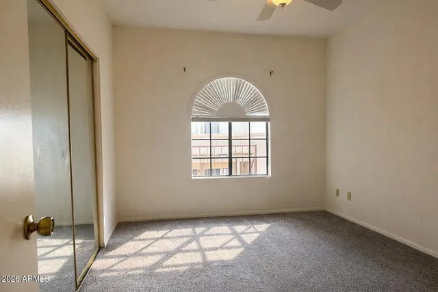 an empty room with windows