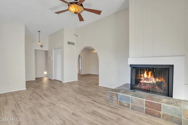 a view of kitchen with granite countertop cabinets and stainless steel appliances