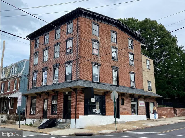 a view of a building on the street