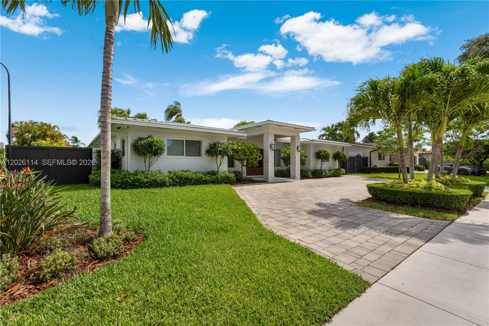 9641 Southwest 66th Street Miami, FL 33173 - Photo 2 of 57 a view of a house with backyard and garden