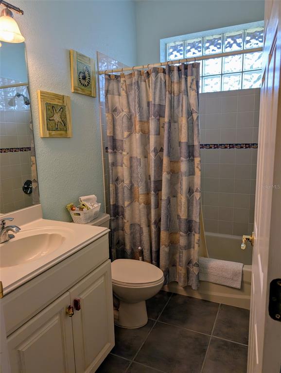 8511 Austrian Boulevard Punta Gorda, FL 33982 - Photo 20 of 20 a bathroom with a sink toilet and shower