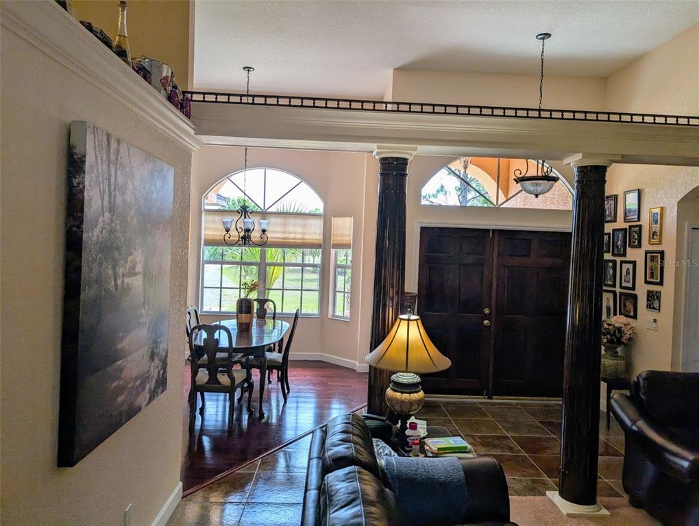 8511 Austrian Boulevard Punta Gorda, FL 33982 - Photo 7 of 20 a view of a livingroom with furniture and entryway