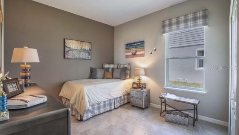 Tbd Southwest 37th Terrace Ocala, FL 34473 - Photo 13 of 22 a bedroom with a bed and a window