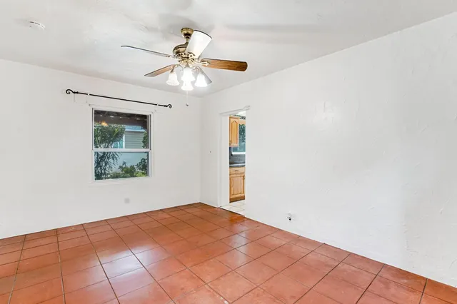 a view of an empty room and window