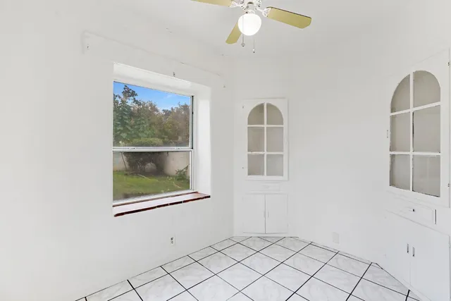 an empty room with windows