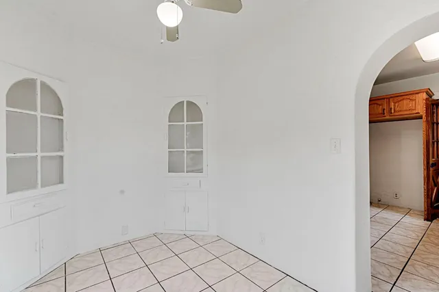 a view of empty room with windows