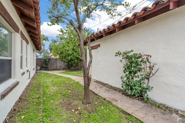 a backyard of a house with lots of green space