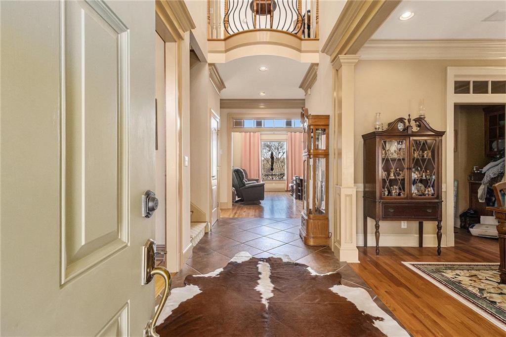898 Harrison Mill Road Bethlehem, GA 30680 - Photo 46 of 72 a view of a livingroom with furniture and a hallway