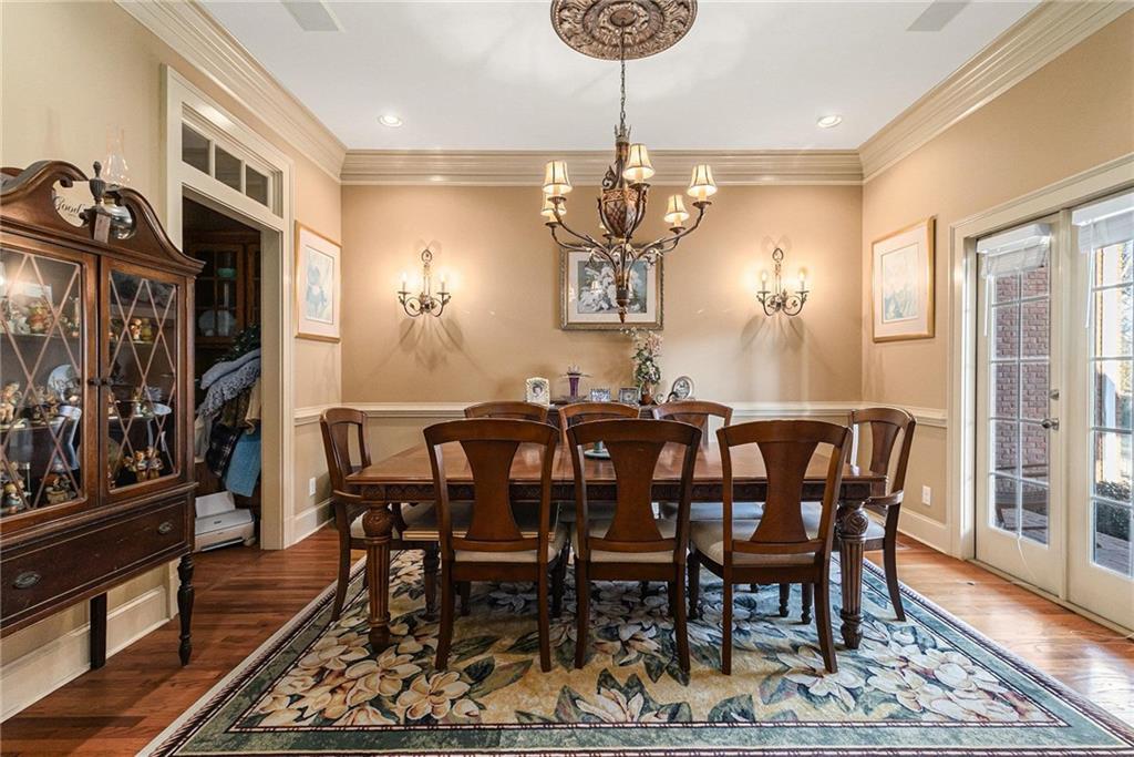 898 Harrison Mill Road Bethlehem, GA 30680 - Photo 47 of 72 a view of a dining room with furniture window and wooden floor