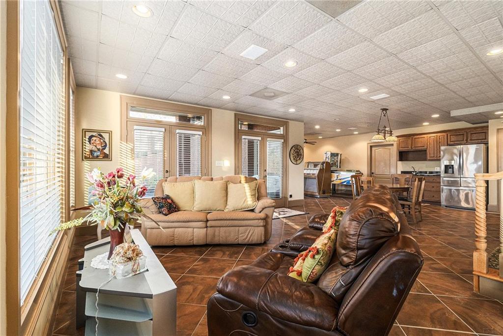 898 Harrison Mill Road Bethlehem, GA 30680 - Photo 72 of 72 a living room with furniture and a table