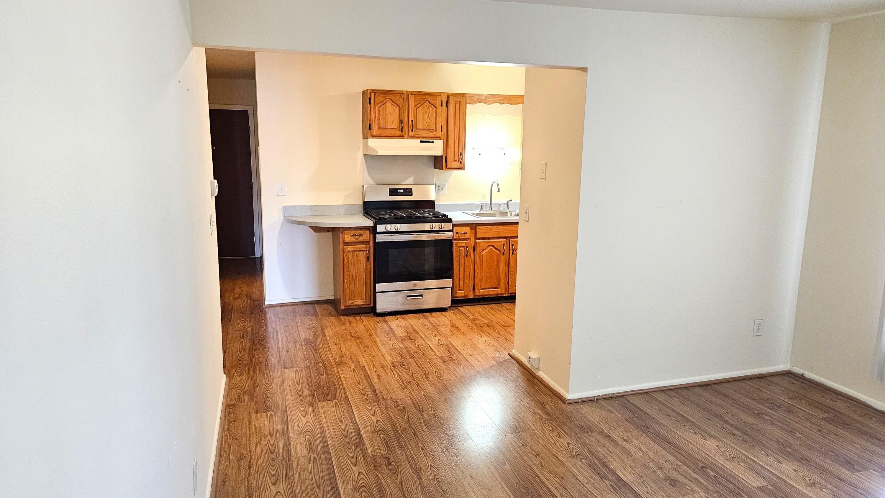 9500 North Green Bay Road, Unit 301 Brown Deer, WI 53209 - Photo 11 of 28 Living Room towards kitchen.