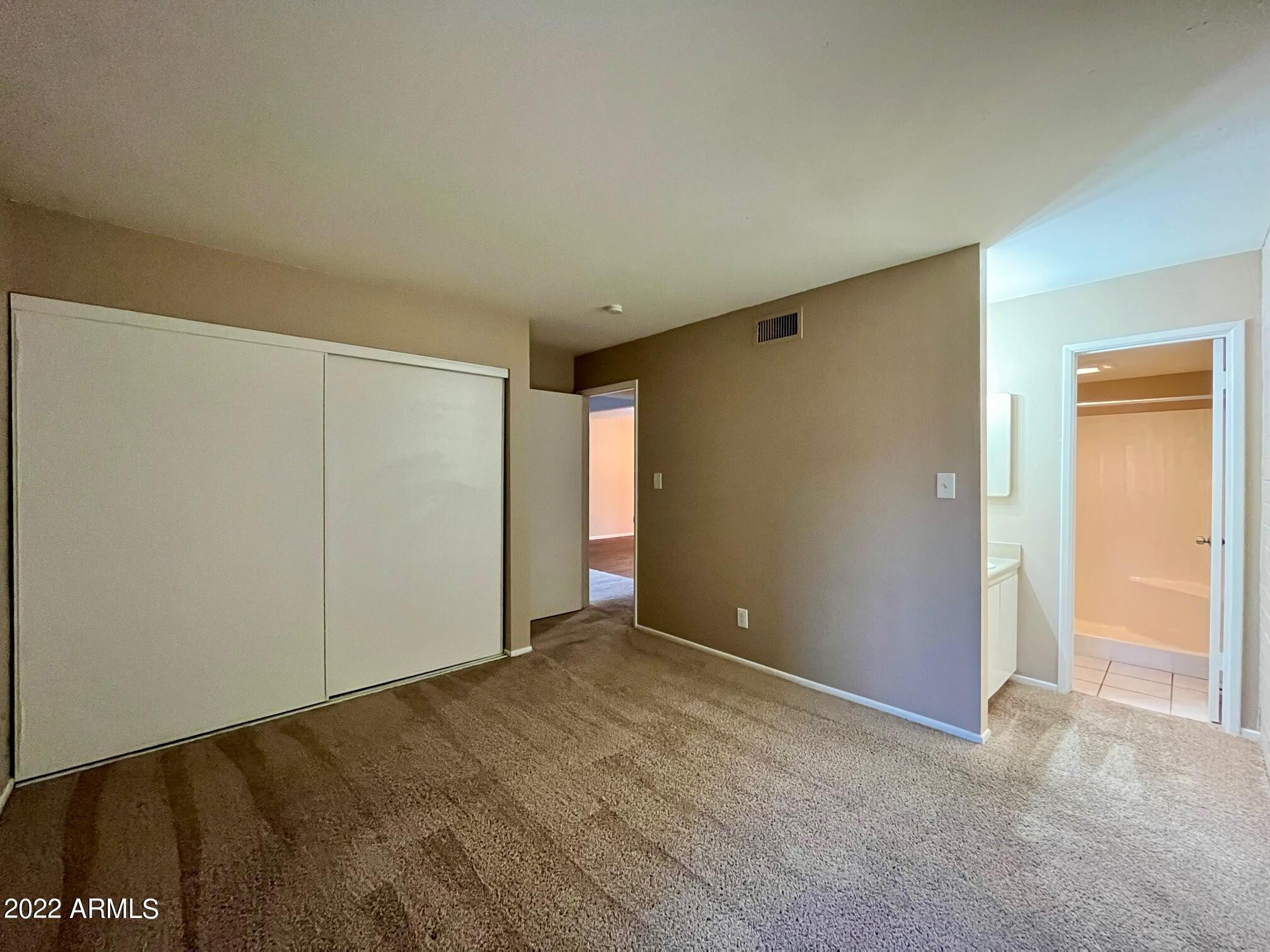 1701 West Tuckey Lane, Unit 225 Phoenix, AZ 85015 - Photo 13 of 13 a view of an empty room