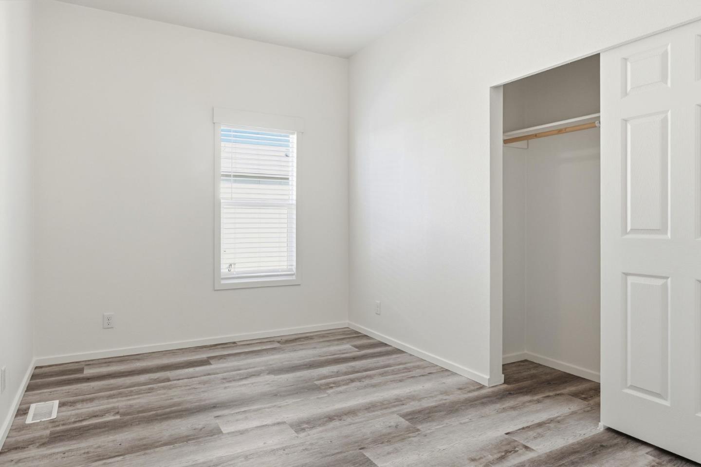 500 West 10th Street, Unit 140 Gilroy, CA 95020 - Photo 19 of 35 wooden floor and window in a room