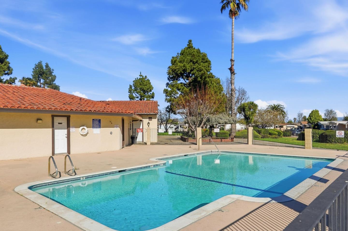 500 West 10th Street, Unit 140 Gilroy, CA 95020 - Photo 33 of 35 a view of a house with a swimming pool