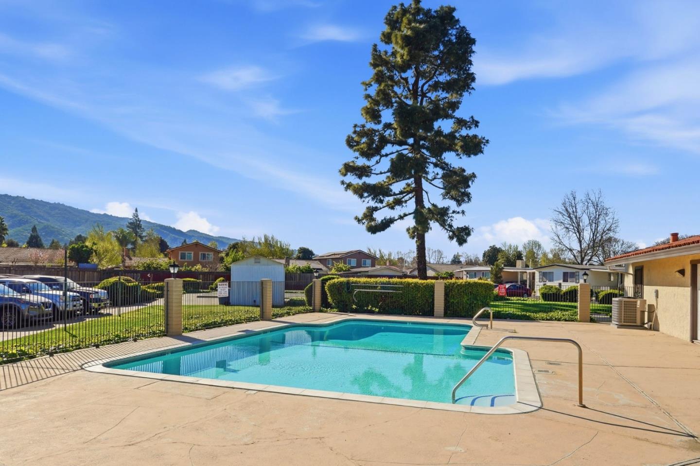500 West 10th Street, Unit 140 Gilroy, CA 95020 - Photo 34 of 35 a view of a swimming pool with a patio