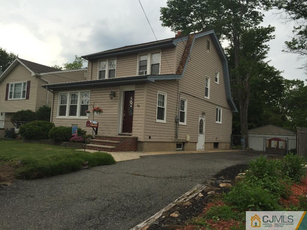 62 Greenbrook Road Middlesex, NJ 08846 - Photo 22 of 24 a front view of a house with a yard