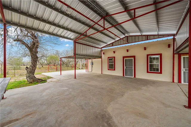 a kitchen with a stove a sink and a refrigerator