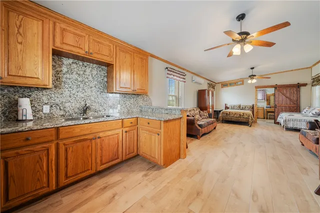 a white toilet sitting next to a bathroom sink
