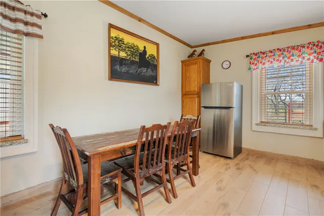 a bedroom with furniture and a window