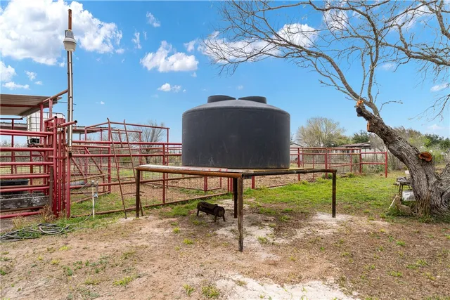 a view of a swimming pool with an outdoor space and seating area