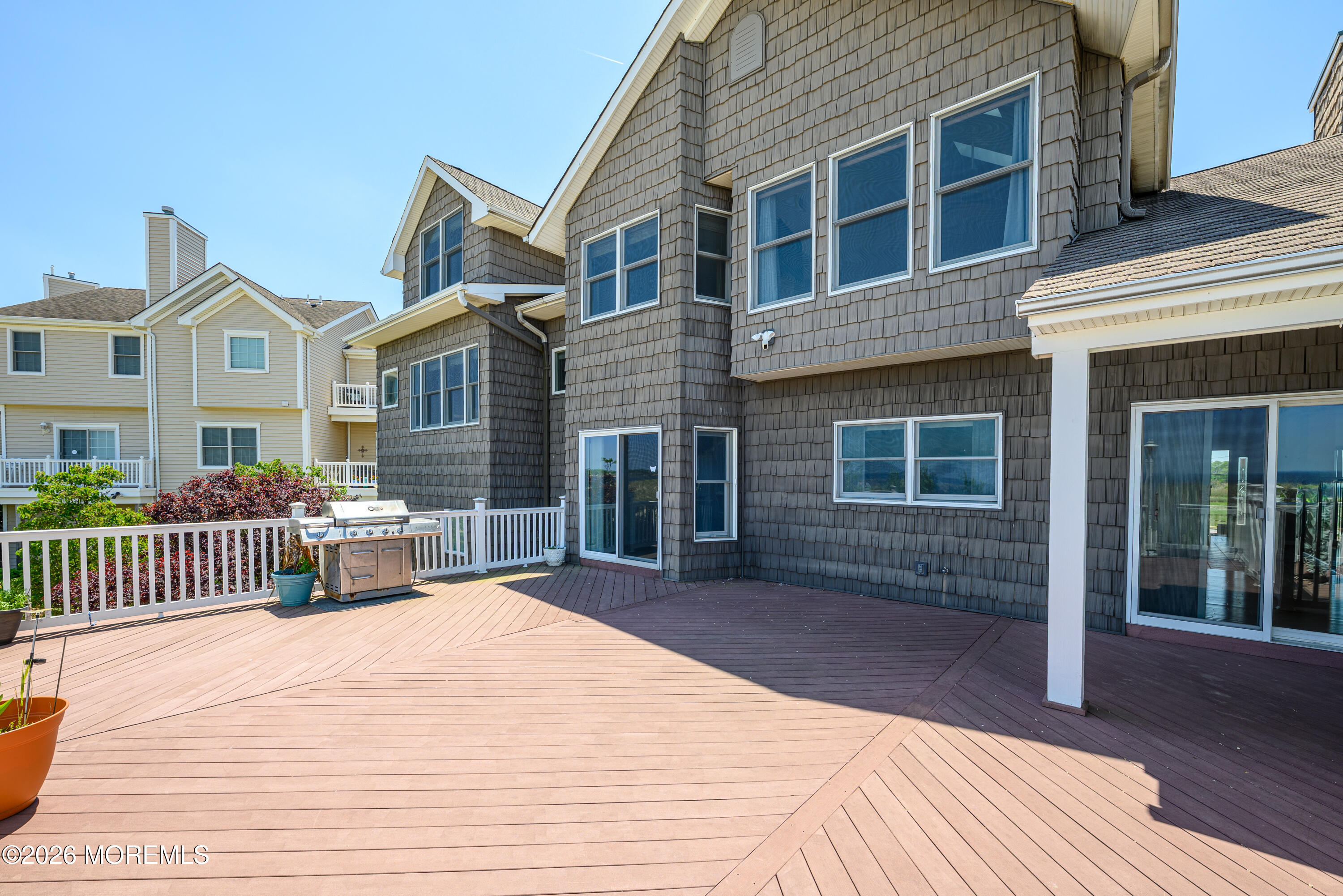 805 Front Street Union Beach, NJ 07735 - Photo 41 of 65 a front view of a house with a garden