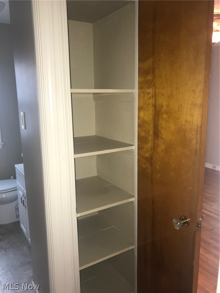 1403 Lorimer Road Cleveland, OH 44134 - Photo 14 of 28 Linen closet next to bathroom