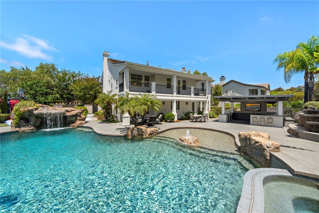 58 Long View Road Coto de Caza, CA 92679 - Photo 1 of 1 a view of a house with swimming pool and sitting area