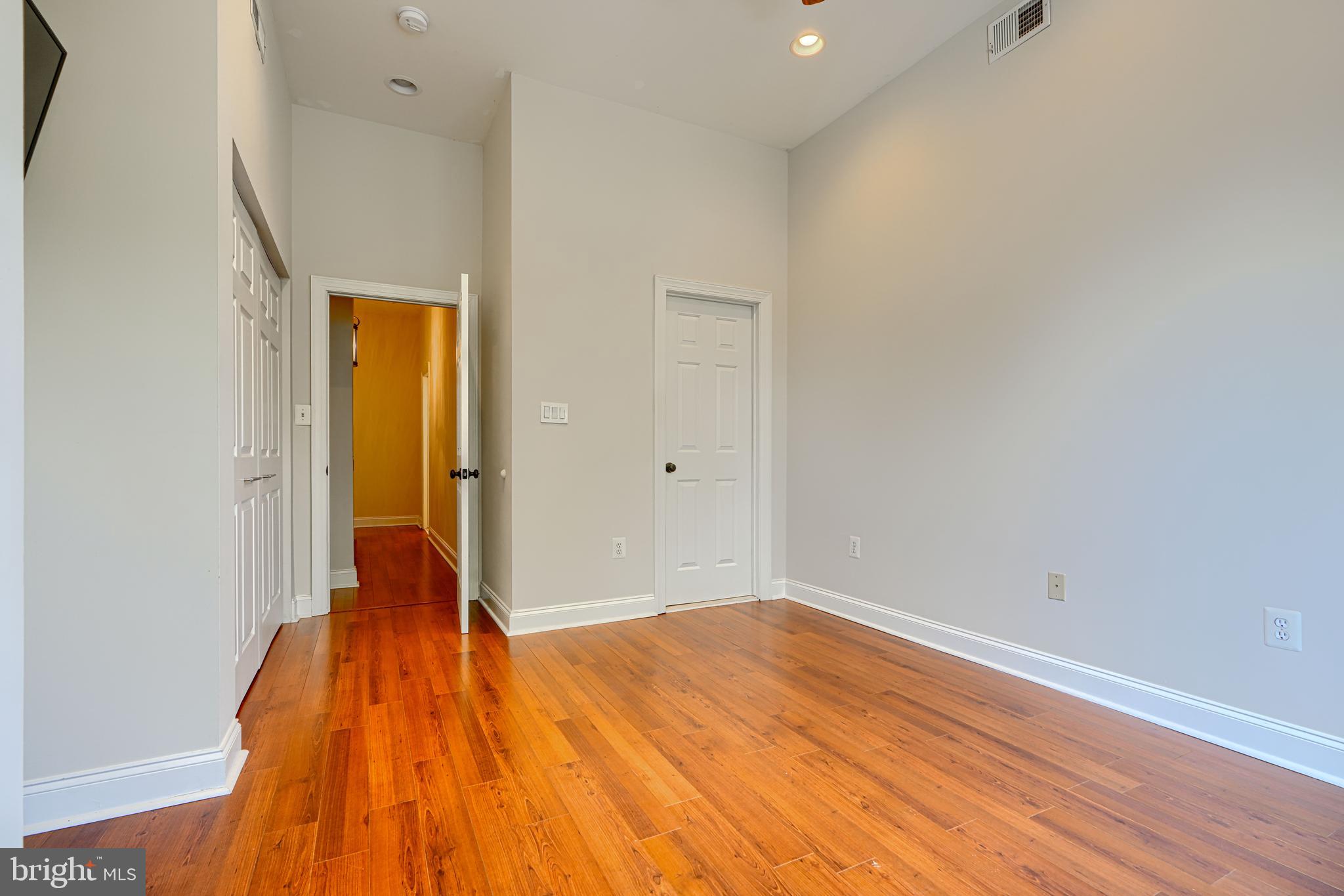 4126 Falls Road Baltimore, MD 21211 - Photo 16 of 35 a view of a room with wooden floor and a sink