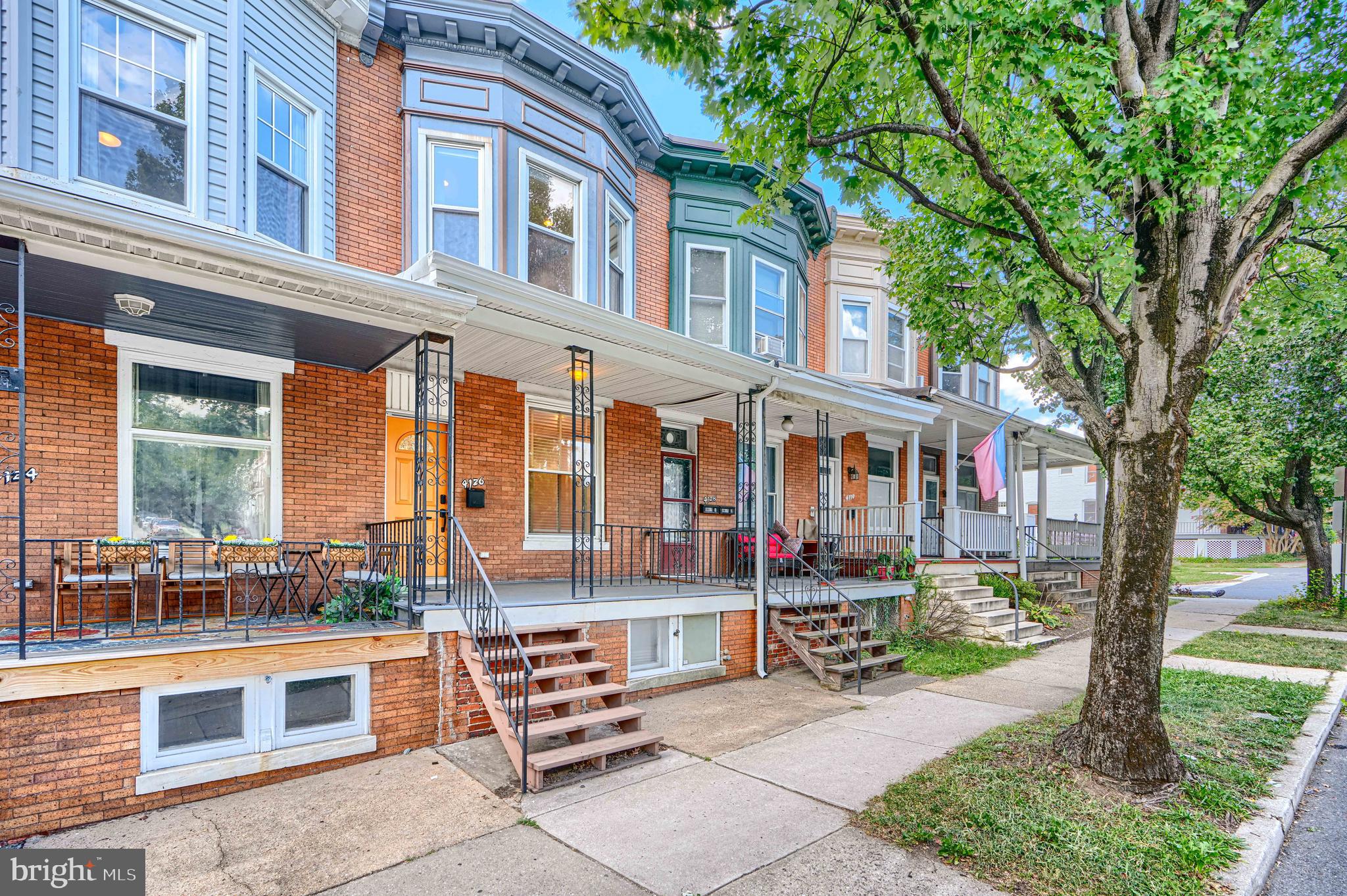 4126 Falls Road Baltimore, MD 21211 - Photo 2 of 35 a front view of a building with street view