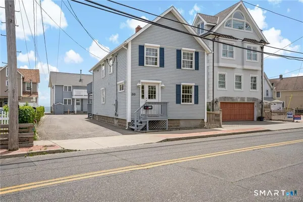 a view of a house with a street