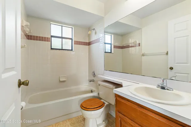 a bathroom with a sink a toilet and a bathtub