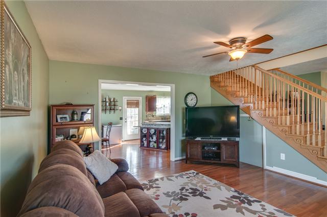 106 Pheasant Hollow Road Dickson, TN 37055 - Photo 3 of 19 Calming colored living area with a lot of natural sunlight
