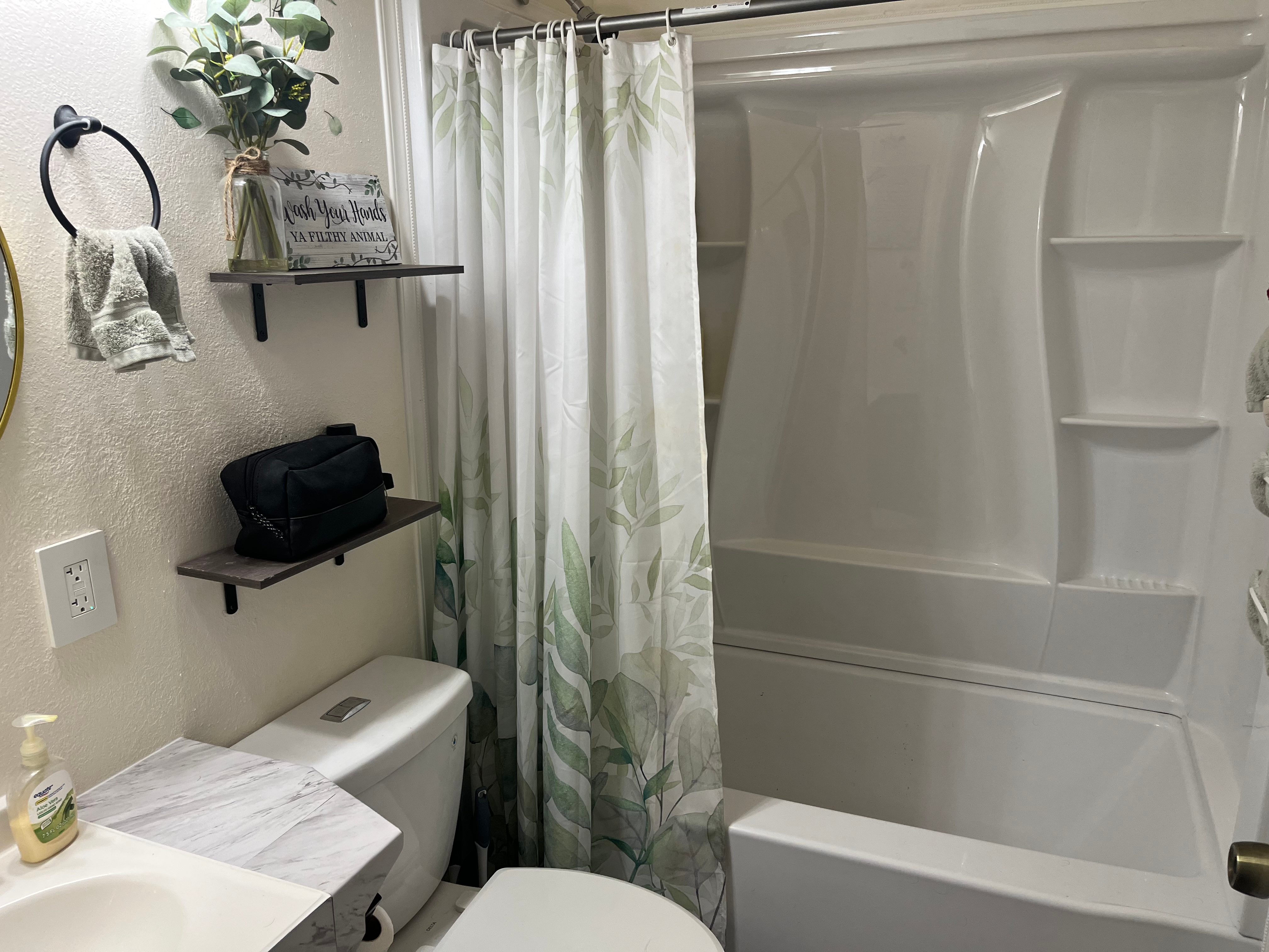 14-3475 Tutu Lane Pahoa, HI 96778 - Photo 12 of 26 a bathroom with a sink a toilet and shower