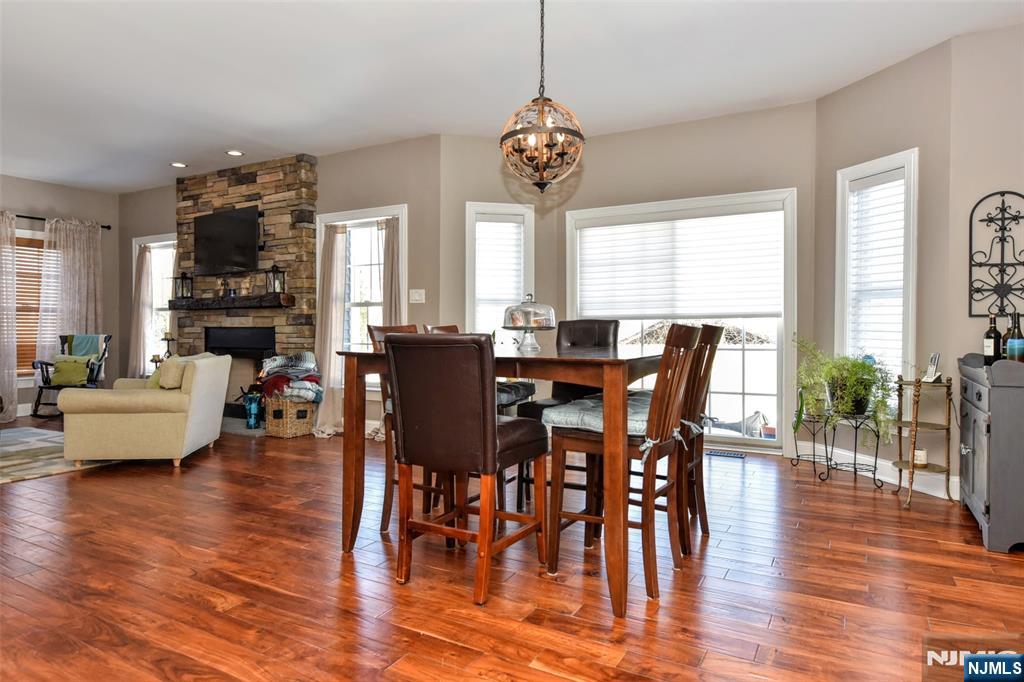 130 Reich Avenue Mahwah, NJ 07430 - Photo 12 of 30 a view of a dining room with furniture window and wooden floor