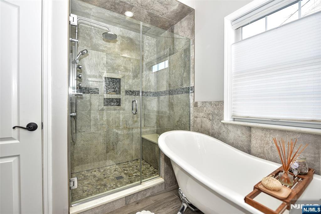 130 Reich Avenue Mahwah, NJ 07430 - Photo 19 of 30 a bathroom with a shower and a sink