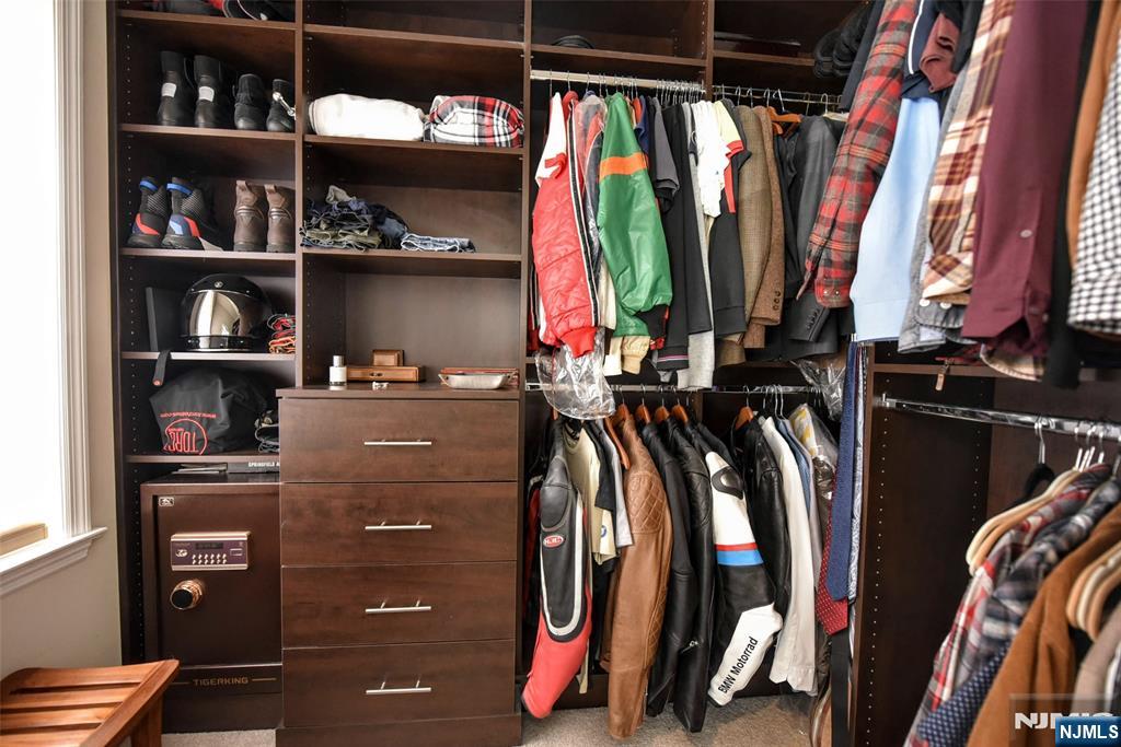 130 Reich Avenue Mahwah, NJ 07430 - Photo 21 of 30 a view of walk in closet with clothes and shoes
