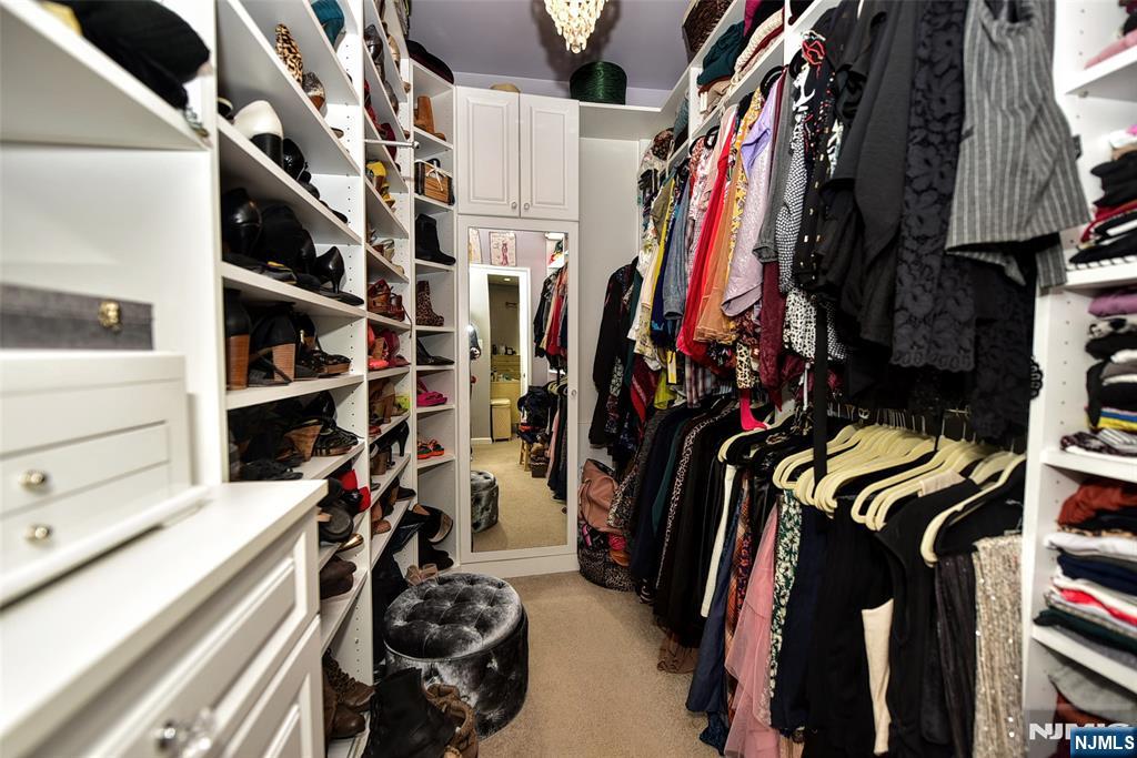 130 Reich Avenue Mahwah, NJ 07430 - Photo 22 of 30 a view of walk in closet with clothes and shoes