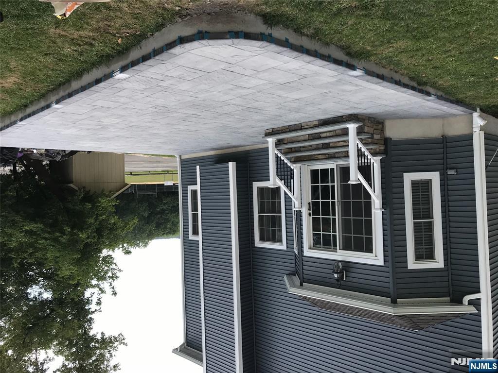 130 Reich Avenue Mahwah, NJ 07430 - Photo 27 of 30 a view of backyard with deck