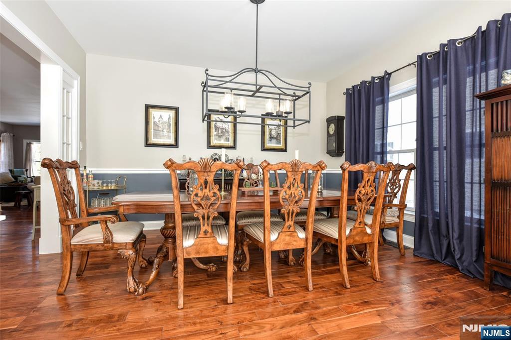 130 Reich Avenue Mahwah, NJ 07430 - Photo 5 of 30 a view of a dining room with furniture window and wooden floor