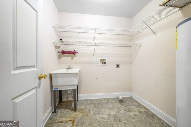 a view of a hallway with closet