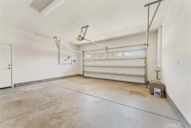 a view of room that has a bed