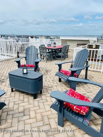 a outdoor space with lots of tables and chairs