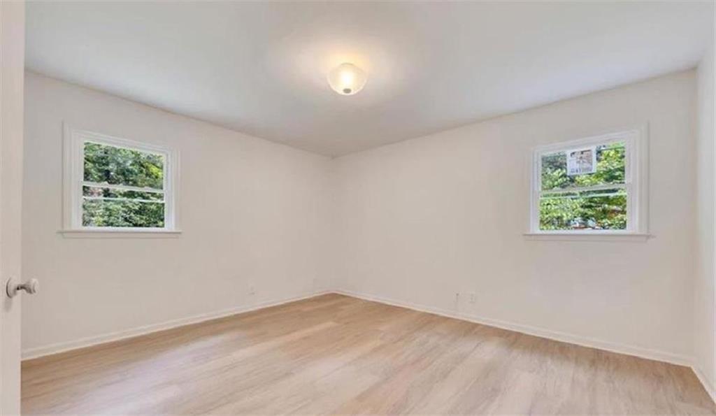 4520 Santa Fe Trail Southwest Atlanta, GA 30331 - Photo 12 of 19 an empty room with a window