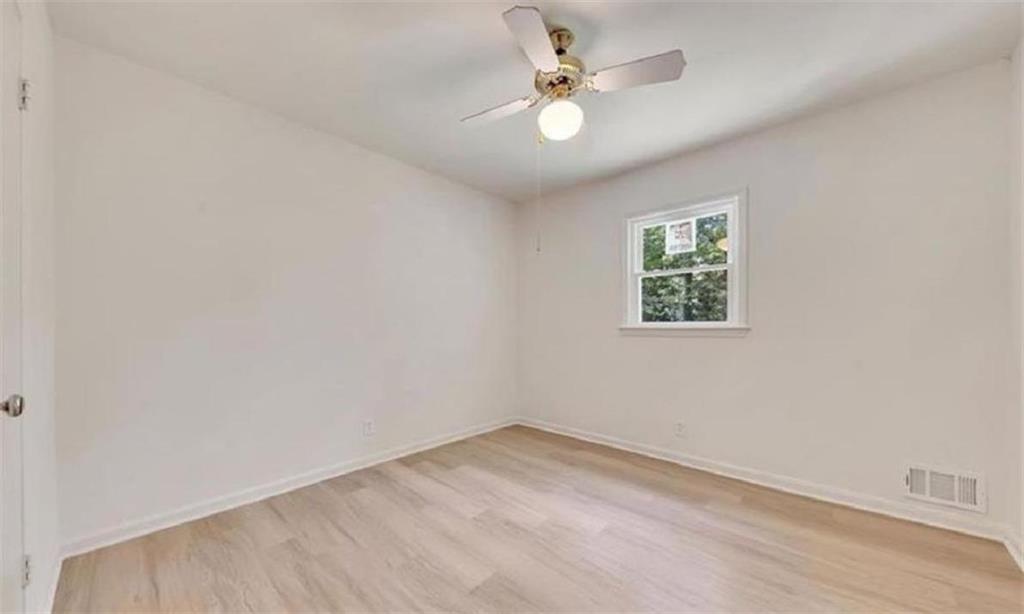 4520 Santa Fe Trail Southwest Atlanta, GA 30331 - Photo 13 of 19 an empty room with a window